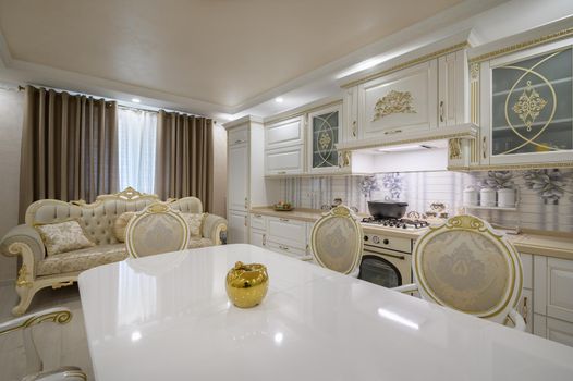 Renovated Interior of rich classic white kitchen