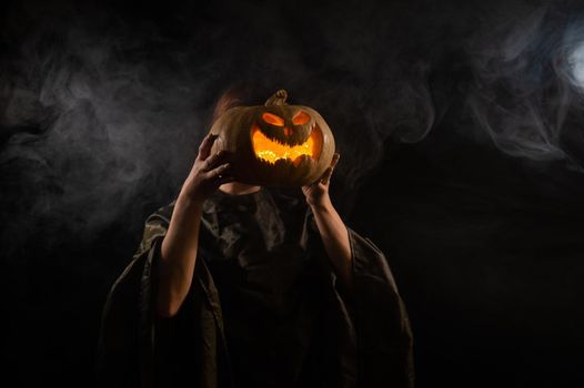 Pumpkin jack o lantern instead of a woman's head. Halloween