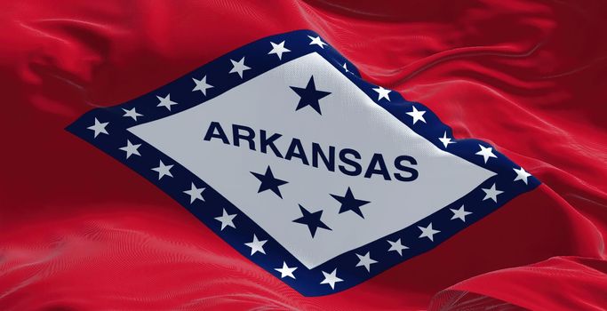 Close-up view of the Arkansas state flag waving in the wind