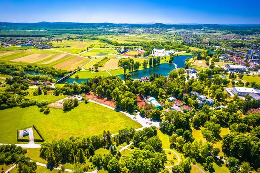 Aerial view of Korana river and green landscape in town of Karlovac