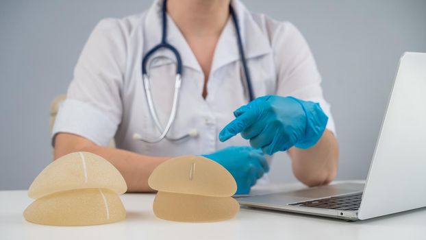 Doctor plastic surgeon explains the benefits of different breast implants.