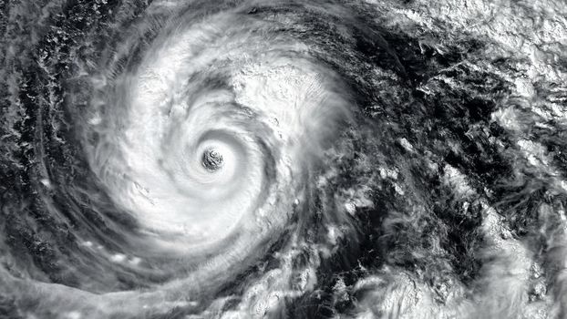 Eye of the Hurricane. Hurricane on a black background. Typhoon over planet Earth. Category 5 super typhoon Views from outer space. Elements of this image furnished by NASA