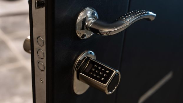 Open door to the apartment with a combination lock. Keyless entry.