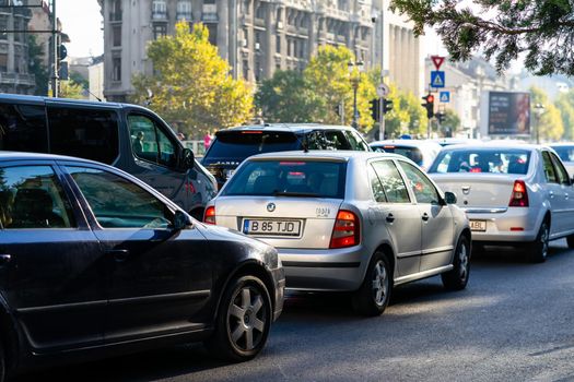 Car traffic at rush hour. Car pollution, traffic jam in Bucharest, Romania, 2022