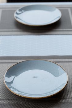 Empty plate of blue glaze ceramic melamine for dinner.