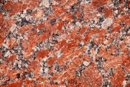 Nature granite texture background. Red granite tile texture close up. Polished decorative stone for photo design. Macro red grey granite decorative tile background may be used as a design pattern