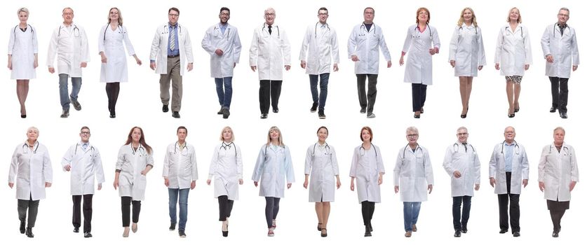group of doctors in motion isolated on white