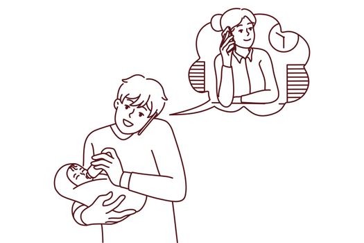 Father feeding baby talk with wife in office