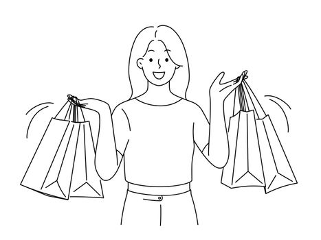 Smiling woman with shopping bags