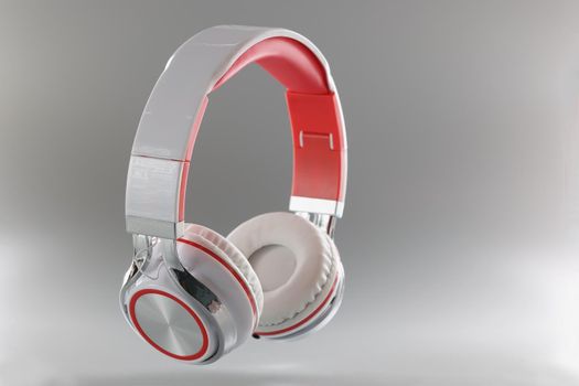 Gray bluetooth wireless headphones, close-up