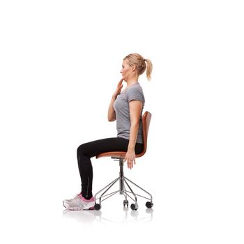 Perfect for your posture. a sporty woman doing stretches on a chair.