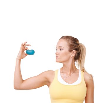 Stress wont get the better of her. Cropped view of a woman squeezing a stress ball against a white background.