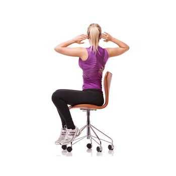 Perfect for your posture. a sporty woman doing stretches on a chair.