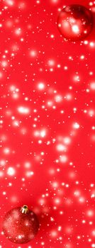 Christmas baubles on red background with snow glitter, luxury winter holiday card