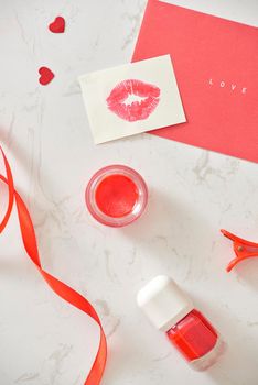 Happy Valentine's Day concept on vintage paper sheet with lipstick