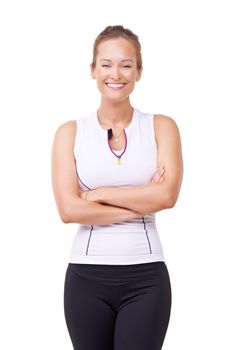 Get fit, get happy. Studio portrait of an attractive woman in gym clothes isolated on white.