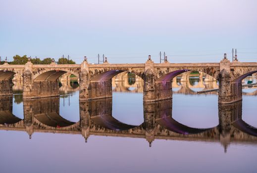 Reflections of Market Street bridge in the Susquehanna river