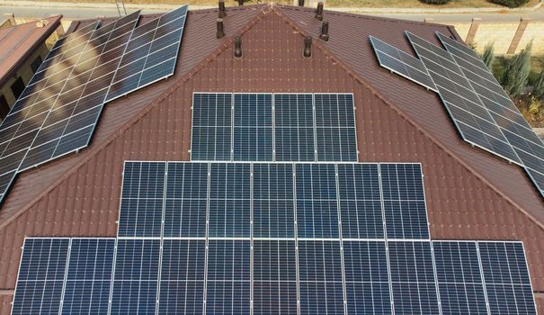 panels on a building. Solar Roof Stock. Solar panels on the roof of a house. download image