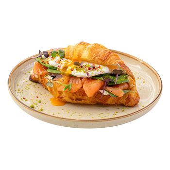Portion of salmon croissant sandwich
