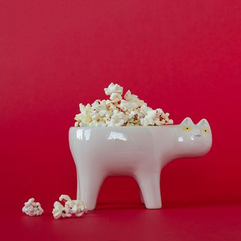 National popcorn day concept. Bowl full of popcorn. Leisure idea. Copy space.