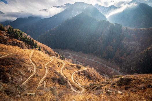 Road serpentines in autumn mountain gorge popular hiking trail The Old Japanese Trail in the Great Almaty Gorge in Kazakhstan