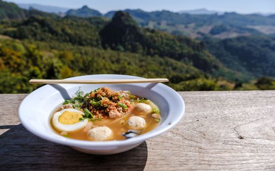Noodle soup in the mountains of Northern Thailand Ban Jabo noodle restaurant famous viewpoint