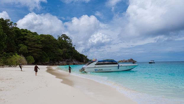 speedboat at awhite tropical beach of the Similan Islands Thailand