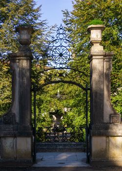 Antique wrought metal gate at the University Botanical Garden in Coimbra
