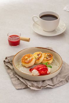 Russian cottage cheese syrniki pancakes with jam