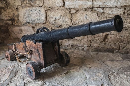 medieval cannon in an old abandoned castle