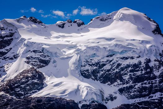 Snowcapped mountain peak with glacier in Cordillera Blanca, Ancash Andes, Peru