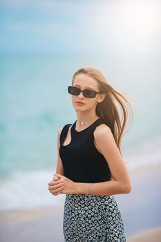 Portrait of adorable girl on the beach