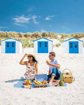 Picnic on the beach Texel Netherlands, couple having picnic on the beach of Texel 