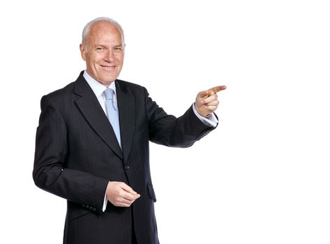 Pointing you to his success secrets. Studio portrait of a mature businessman pointing at copyspace to the right.