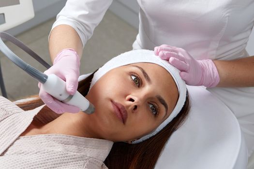 Face Skin Care. Close-up Of Woman Getting Facial Hydro Microdermabrasion Peeling Treatment At Cosmetic Beauty Spa Clinic. Hydra Vacuum Cleaner. Exfoliation, Rejuvenation And Hydratation