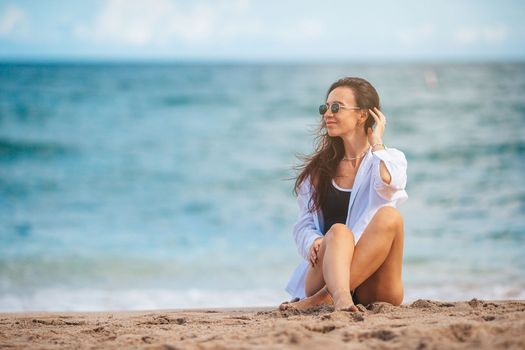 Young beautiful woman relax on the beach