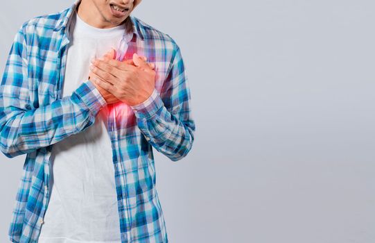 People with chest pain isolated, young man with tachycardia, man with heart pain on isolated background, young man with heart pain. Concept of people with heart problems