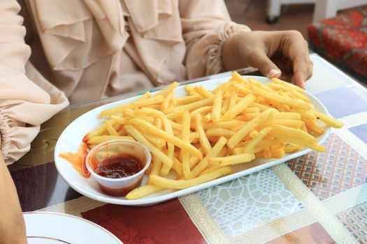 detail shot of French Fries on table 