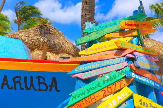 Aruba and Crossroads set signs distances, various locations around the world