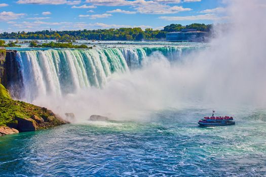 Tourist ship surrounded by heavy mist in Niagara Fall's Horseshoe Falls