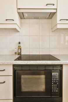 a kitchen with a microwave oven and a counter top