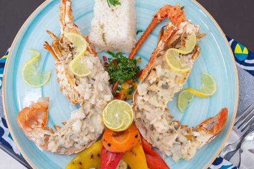 Lobster dish a la carte meal with white rice and vegetables
