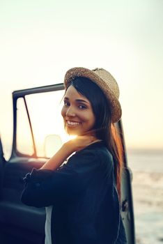 Summers here and adventure is calling my name. a young woman enjoying a relaxing roadtrip.