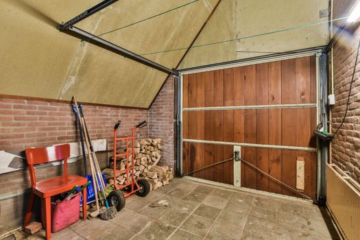 Spacious garage with brick walls