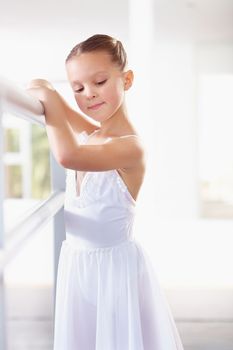 Ive got big ballet dreams. a young girl practicing ballet in the studio.