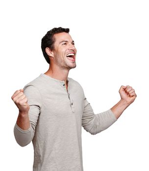Happy, excited man and celebration for winning, discount or goal against a white studio background. Isolated male model winner with smile celebrating win, sale or achievement on mockup.