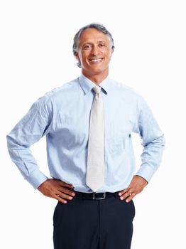 Smiling business man with hands on waist. Portrait handsome mature business man smiling with hands on waist over white background.