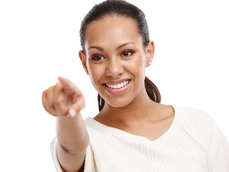 There he is. Head and shoulders shot of a young woman pointing her finger while standing in a studio-isolated on white.