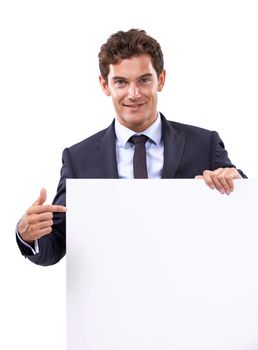 Excited to sell your words. A young businessman holding up a blank placard.