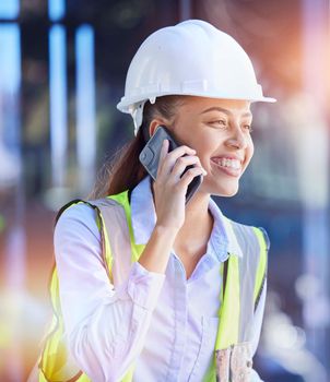 Construction worker, woman with smartphone for phone call and communication with technology and helmet for safety. Happy with construction, building industry and mobile phone, contact with lens flare